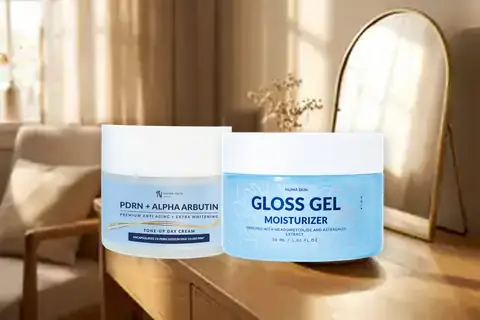 Dua jar Numa Skin PDRN Day Cream 30gr dan Calming Barrier Gloss Gel 30ml di meja rias